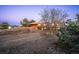 Charming wood home on a hill, featuring a private setting with mature trees at 10353 N Chatfield Dr, Littleton, CO 80125