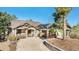Craftsman-style home with stone accents, a covered porch, and mature trees for a private setting at 2091 Ramblewood Ct, Castle Rock, CO 80104