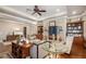 Elegant living area with a fireplace, custom built-ins, and comfortable seating perfect for relaxation at 2091 Ramblewood Ct, Castle Rock, CO 80104