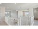 Open upstairs hallway offering natural light, bright walls, grey carpet, and easy access to other rooms at 13900 Hanging Lake St, Parker, CO 80138