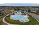 Community pool and clubhouse with surrounding homes at 6845 W Evans Ave, Denver, CO 80227