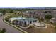 Aerial view of community pool, clubhouse, and homes at 6845 W Evans Ave, Denver, CO 80227