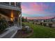 Landscaped backyard with patio and sunset at 6845 W Evans Ave, Denver, CO 80227