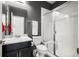 Clean bathroom with shower, toilet and vanity at 6845 W Evans Ave, Denver, CO 80227