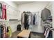 Walk-in closet with ample shelving and hanging space at 6845 W Evans Ave, Denver, CO 80227