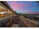 Deck at sunset with mountain view at 6845 W Evans Ave, Denver, CO 80227