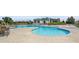 Community pool with a clubhouse and plenty of lounge chairs at 6845 W Evans Ave, Denver, CO 80227