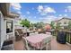 Outdoor deck features patio table, chairs, grill, outdoor furniture, and fire pit at 3305 White Oak Ln, Highlands Ranch, CO 80129