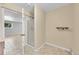 Bathroom featuring tiled floors, a shower, and a doorway leading into another room at 11000 Eudora Cir, Thornton, CO 80233