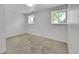 Bedroom with carpeted floors and two windows offering natural light and outside view at 11000 Eudora Cir, Thornton, CO 80233