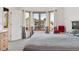 Bright bedroom featuring a bay window, comfortable carpet, and a serene, relaxing atmosphere at 5282 Devon Ave, Castle Rock, CO 80104