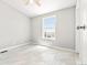 Cozy bedroom with a large window offering scenic views and neutral walls at 41575 E 88Th Ave, Bennett, CO 80102
