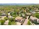 Expansive aerial view of a luxury home featuring a beautiful neighborhood and mountain views at 2595 S Harlan Ct, Lakewood, CO 80227