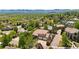 Stunning aerial shot capturing a beautiful home nestled in a scenic, tree-lined community at 2595 S Harlan Ct, Lakewood, CO 80227