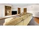 Relaxing living room includes built-in shelves, a plush sofa, and recessed lighting at 2595 S Harlan Ct, Lakewood, CO 80227
