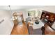 Spacious living room featuring an open floor plan with hardwood floors and a cozy fireplace at 2595 S Harlan Ct, Lakewood, CO 80227