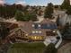 Aerial view of house, showcasing backyard, deck, and solar panels at 9724 E Villasur Ct, Parker, CO 80134