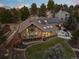 Aerial view of house with solar panels and landscaped yard at 9724 E Villasur Ct, Parker, CO 80134