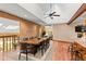 Spacious dining room with large wood table and seating for eight at 9724 E Villasur Ct, Parker, CO 80134