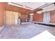 Unfinished garage space with storage and ample room at 12341 E Cedar Cir, Aurora, CO 80012