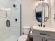 Stylish bathroom featuring a glass shower, modern fixtures, and neutral tones at 14687 Eudora St, Thornton, CO 80602