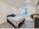 Cozy bedroom featuring a bed, pillows, carpet and a window providing natural light at 14687 Eudora St, Thornton, CO 80602