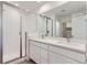 Bathroom features double sinks, quartz countertops, and stand up shower at 1284 S Algonquian St, Aurora, CO 80018