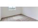 Bedroom featuring neutral carpet, natural light and neutral paint at 1284 S Algonquian St, Aurora, CO 80018