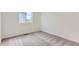 Bedroom features neutral carpet and natural light at 1284 S Algonquian St, Aurora, CO 80018