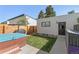 Enclosed backyard has a hot tub, patio, and a grassy area, creating a private retreat at 4506 N Vrain St, Denver, CO 80212