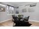 Modern dining room with glass table, stylish chairs, and contemporary lighting at 4506 N Vrain St, Denver, CO 80212