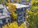 Aerial view of modern home featuring multiple balconies and surrounding trees at 4506 N Vrain St, Denver, CO 80212