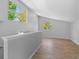 Bonus room featuring wood flooring and light gray walls and trim at 2518 S Patton Ct, Denver, CO 80219