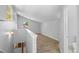 Bonus room featuring wood flooring and light gray walls and trim at 2518 S Patton Ct, Denver, CO 80219