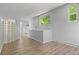 Bonus room featuring wood flooring and light gray walls and trim at 2518 S Patton Ct, Denver, CO 80219