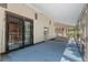 Enclosed sunroom featuring sliding glass doors and awning windows at 2518 S Patton Ct, Denver, CO 80219