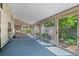 Bright sunroom with multiple sliding glass doors and windows offering ample natural light at 2518 S Patton Ct, Denver, CO 80219