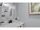 Bathroom with a modern vanity, a mirror, a sink, and tasteful decor for a clean, updated look at 1287 Benton St, Lakewood, CO 80214