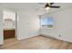 Bright bedroom features a ceiling fan and a window with natural light at 1287 Benton St, Lakewood, CO 80214