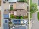 Aerial view of the property featuring a backyard, with plenty of outdoor space and solar panels at 2021 Eliot St, Denver, CO 80211