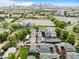 Enjoy city living from this well-placed neighborhood near parking, and featuring energy-saving solar panels at 2021 Eliot St, Denver, CO 80211