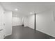 Unfinished basement with concrete floors and white walls at 2021 Eliot St, Denver, CO 80211