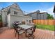 Enjoy outdoor dining on the deck with a grill and rooftop deck access at 2021 Eliot St, Denver, CO 80211