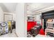 Storage area with shelves, chair, and ample space for organizing belongings at 2021 Eliot St, Denver, CO 80211