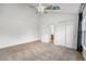 Bedroom with carpet, neutral walls, multiple closets, and a vaulted ceiling at 1915 S Hannibal St # G, Aurora, CO 80013