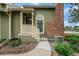 Inviting home featuring a covered porch, brick detail, and a walkway at 1915 S Hannibal St # G, Aurora, CO 80013