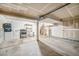 Spacious garage with laundry, an oven, and stairs offers ample space for parking and storage at 1915 S Hannibal St # G, Aurora, CO 80013