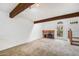Cozy living room with a fireplace and natural light at 1915 S Hannibal St # G, Aurora, CO 80013