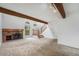 Bright living area featuring a fireplace, stairs and an open layout at 1915 S Hannibal St # G, Aurora, CO 80013