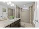 Basement bathroom with a walk-in shower and granite countertop at 2885 Hudson St, Denver, CO 80207